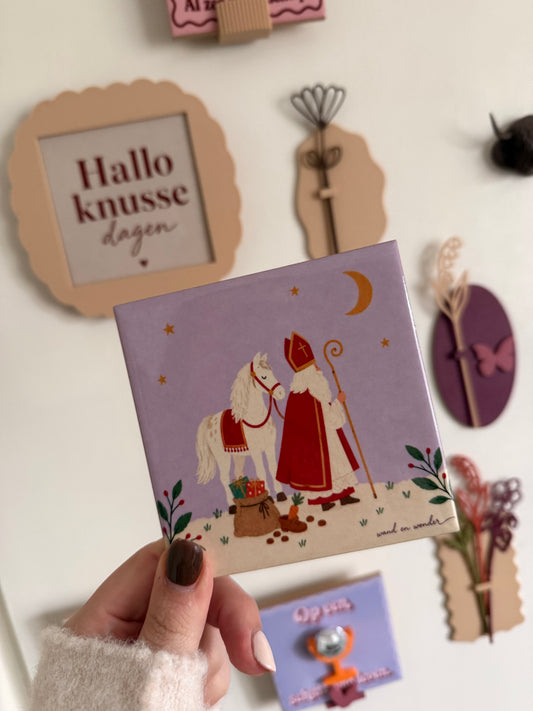 Sinterklaas en zijn paard onder de maan