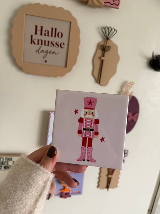 Notenkraker met ster – roze kersttegel